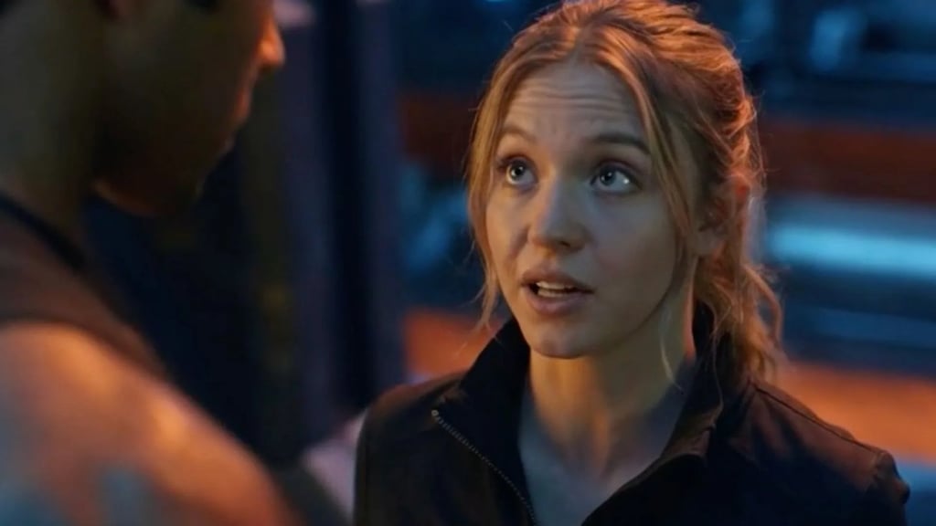 Screengrab from AI-generated video of a woman that looks like Sydney Sweeney posted by Elon Musk.