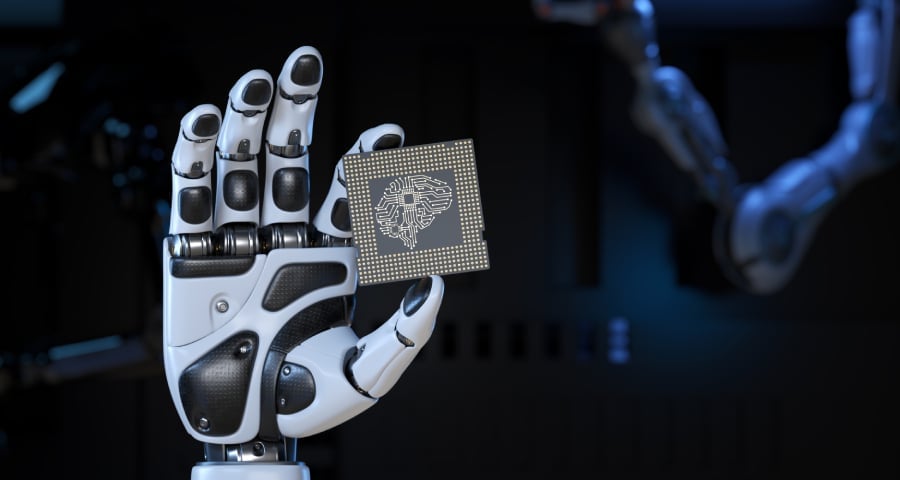 Robot's Hand Holding an Artificial Intelligence Computer Processor Unit.