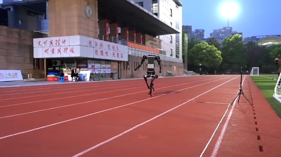Screenshot from Unitree's YouTube channel featuring a robot running on track.