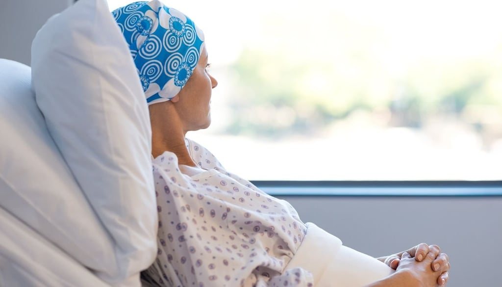 Patient lying in bed looking at the window