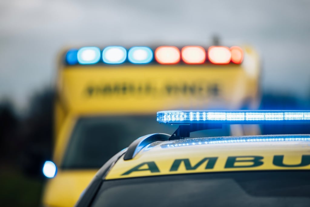 Ambulance car of emergency medical service on road.