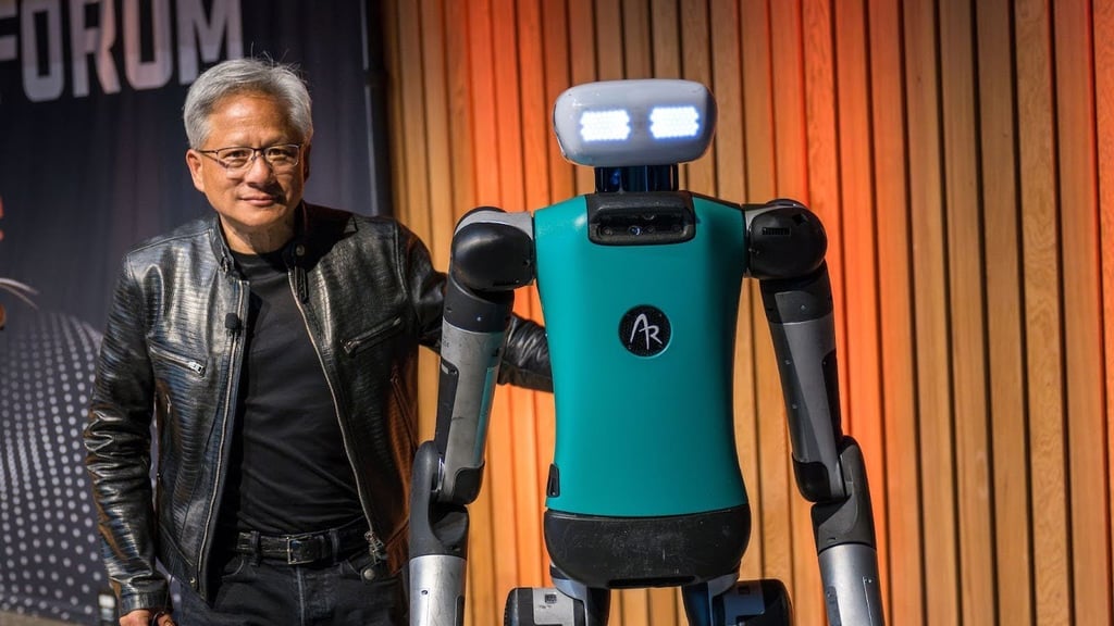 Robot presented by a man.