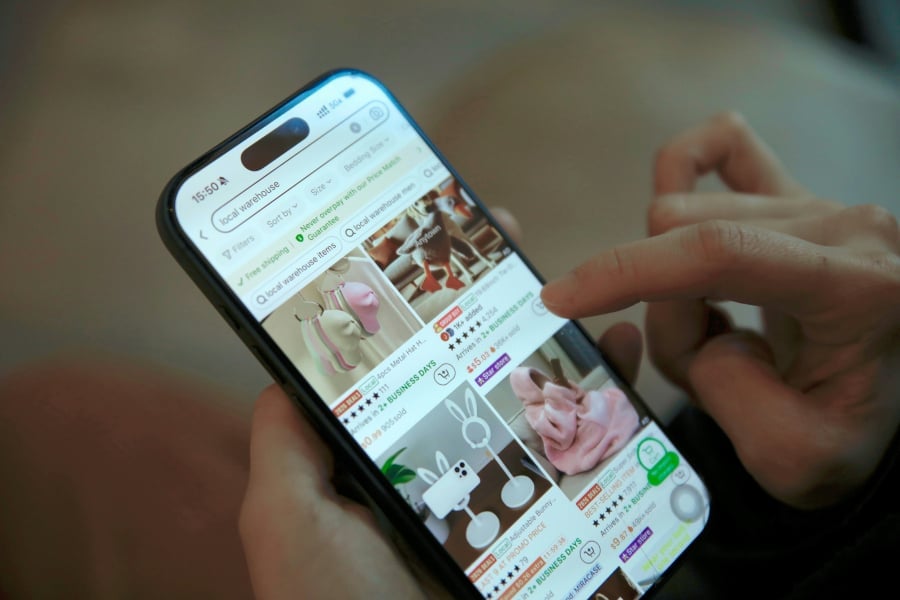 A person shopping on smartphone.