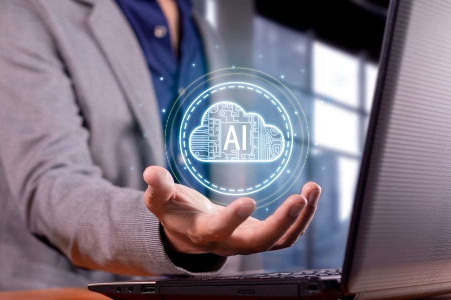 A man holding an AI cloud on his fingertips.