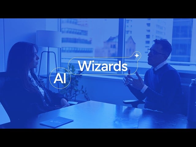 AI Wizards on blue background with 2 people talking in the office.