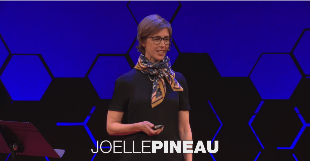Joelle Pneau on stage at TED