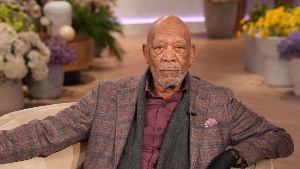 Morgan Freeman sitting on a couch.