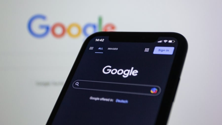 A smartphone with Google Search in browser tab.