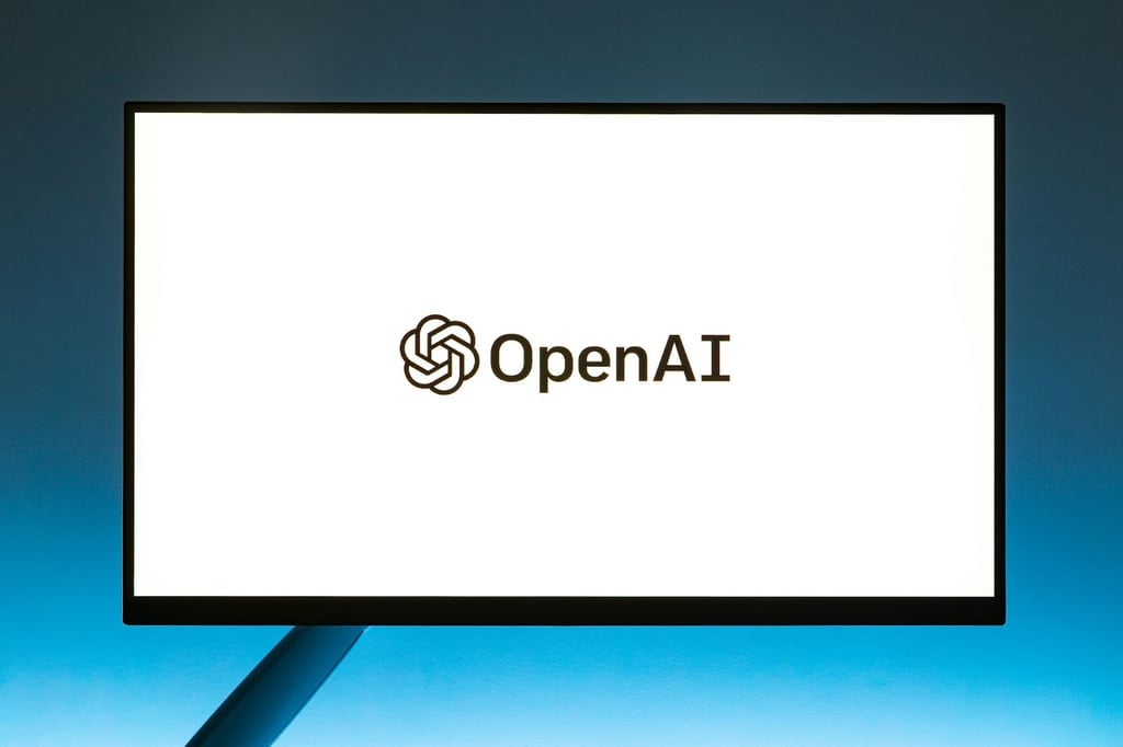 OpenAI logo on computer monitor.