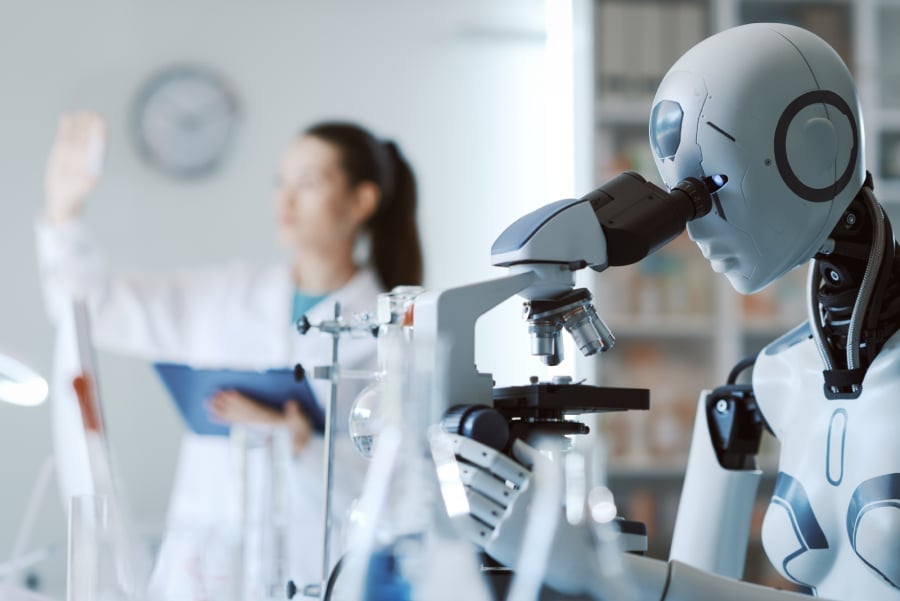 Female scientist and AI robot working together in the science lab.
