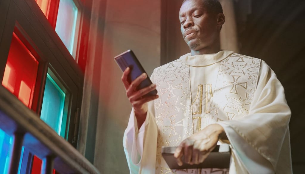 Priest holding a smartphone