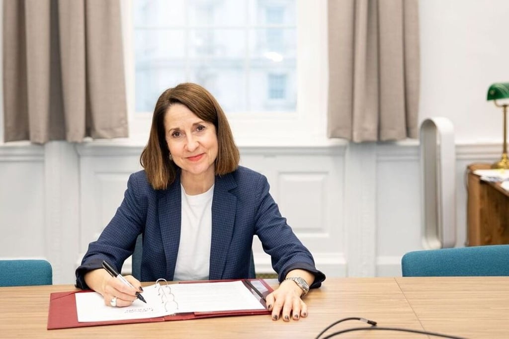 Technology Secretary Liz Kendall signs the government's new partnership with Google DeepMind. Source: UK Government