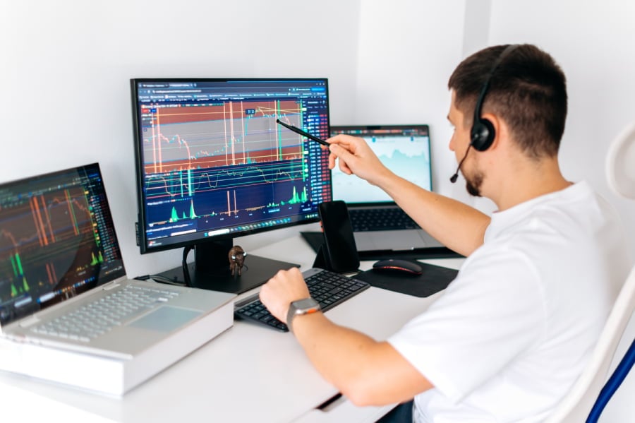 A man tracking the stox exchange.