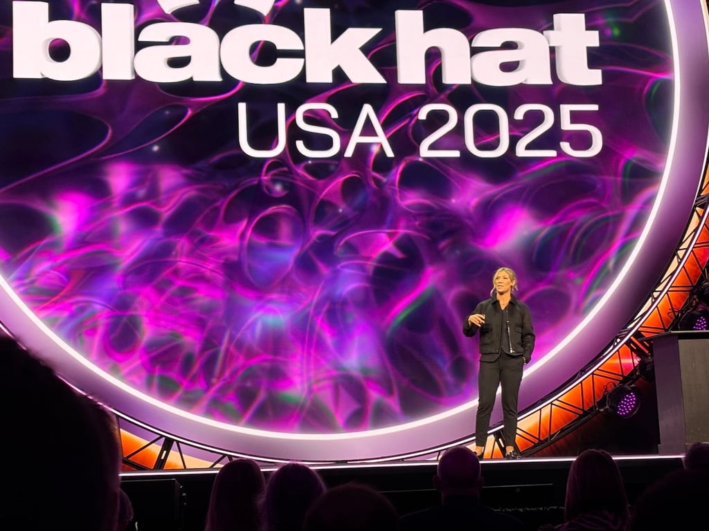 Photo of Nicole Perlroth, former New York Times reporter and founding partner of Silver Buckshot Ventures, speaking at Black Hat 2025 in Las Vegas.
