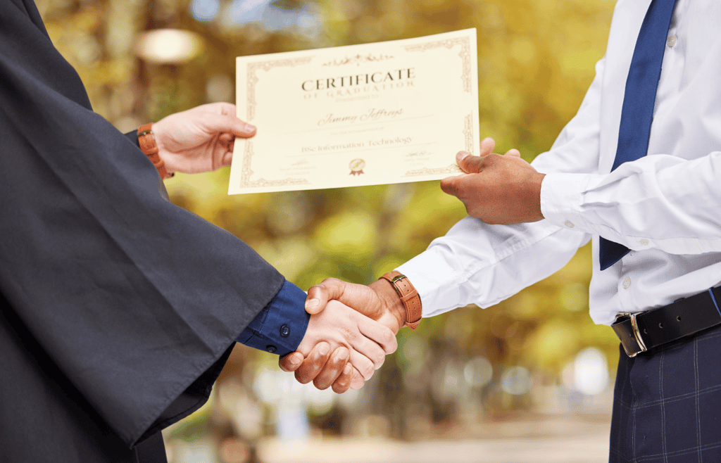 Shaking hands, graduation and certificate for college student with congratulations