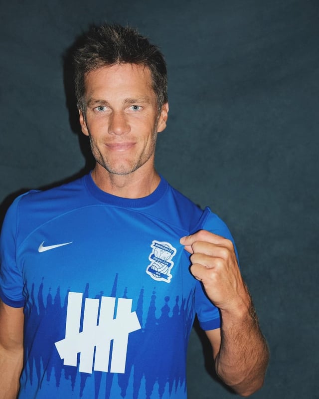 Tom Brady proudly represents Birmingham with blue pride.