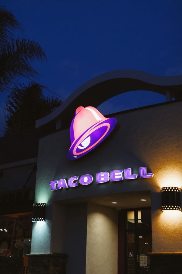 Taco Bell sign outside in the night.
