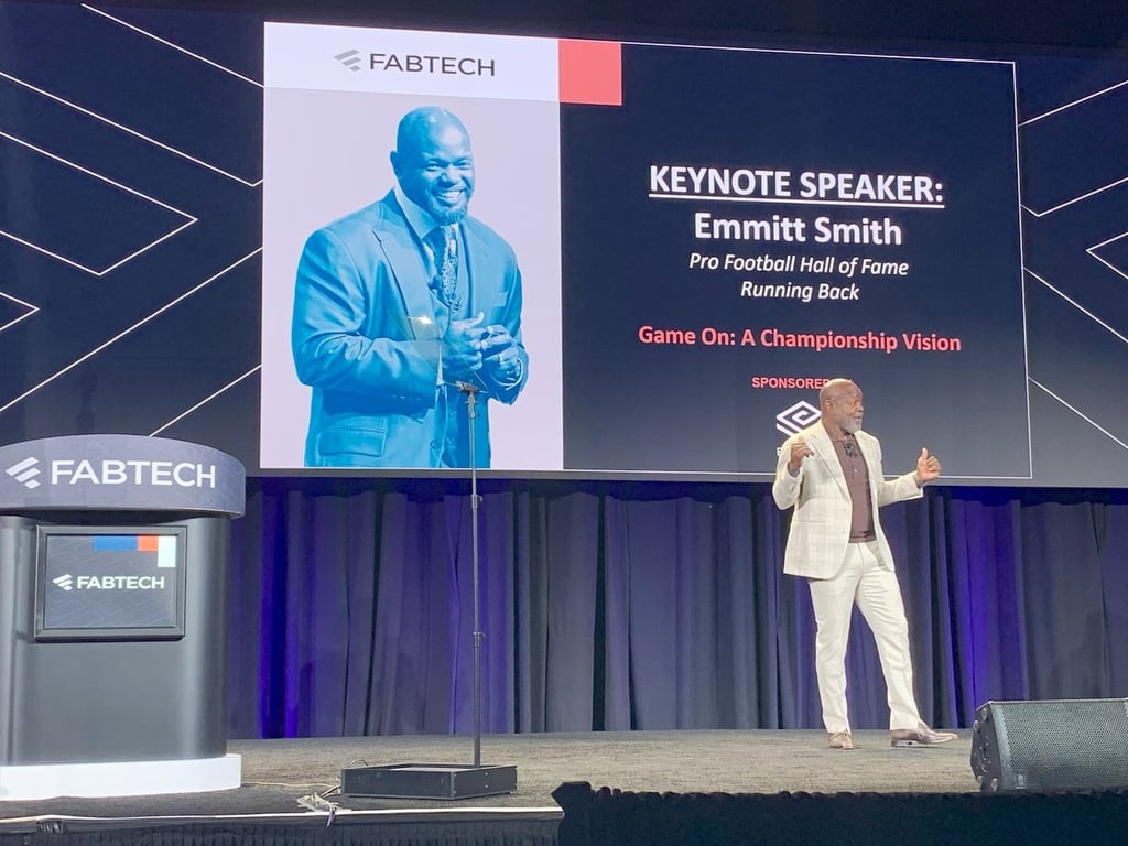 NFL legend Emmitt Smith giving his keynote presentation at FABTECH 2025.