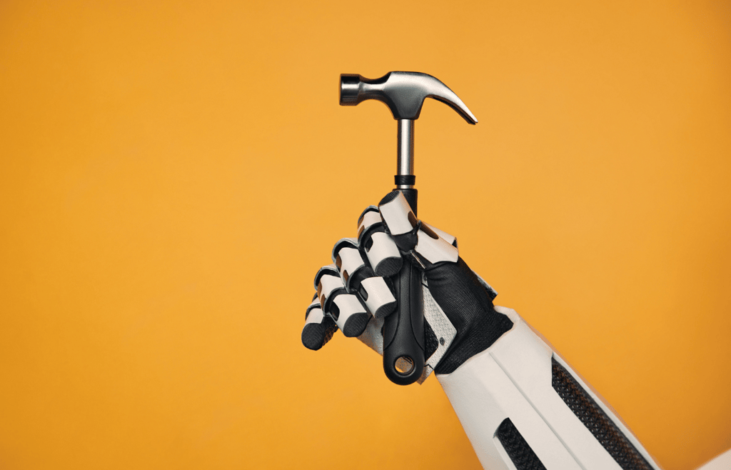 Robot isolated on orange background